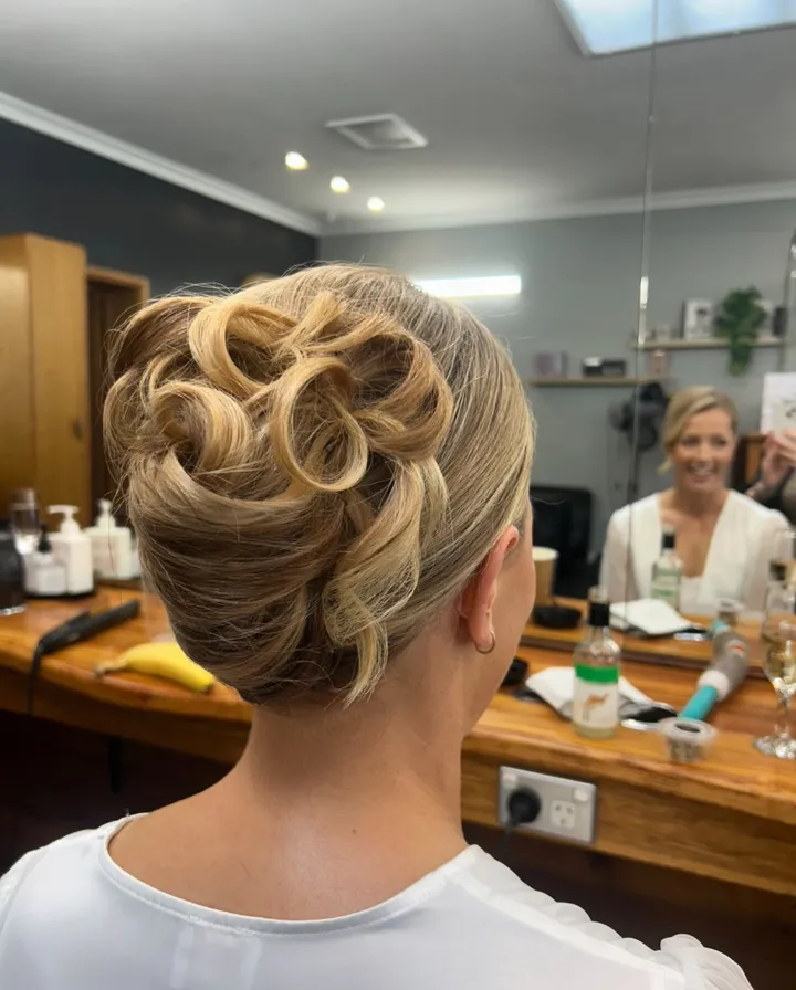 Curled blonde updo
